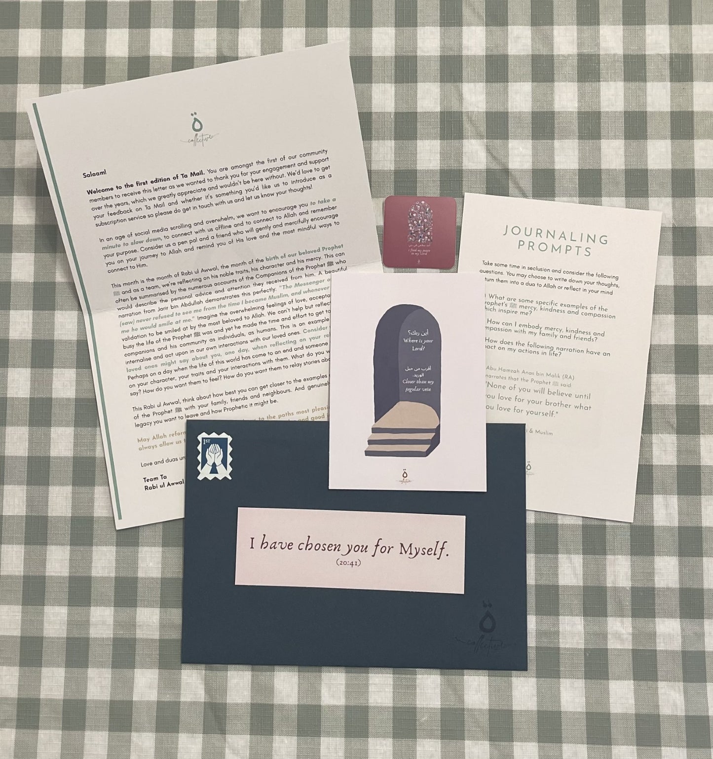 Set of cards and stationery items on a checkered background